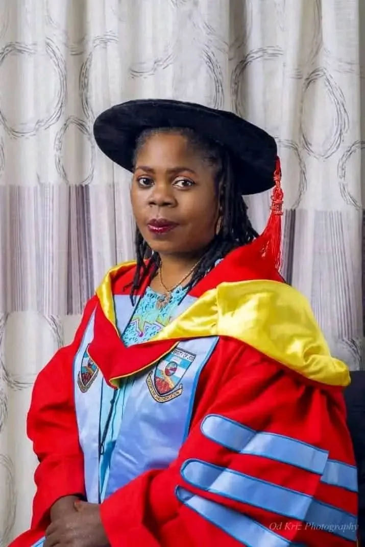 Mnguember Vicky Sylvester in academic regalia
